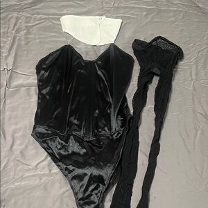 Leg Avenue Black Bodysuit with Bunny Tail, White Collar and fishnet hose.